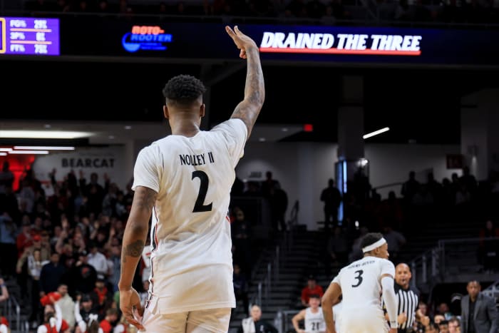 Jan 11, 2023; Cincinnati, Ohio, USA; Cincinnati Bearcats guard Landers Nolley II (2) reacts to making a three-point basket against the East Carolina Pirates in the second half at Fifth Third Arena. Mandatory Credit: Aaron Doster-USA TODAY Sports